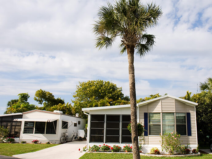 Beautiful view of one of the many Manufactured Home neighborhoods available at Good Samaritan Society - Kissimmee Village in Kissimmee, Florida.