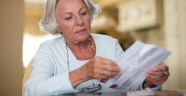 Woman reading paperwork
